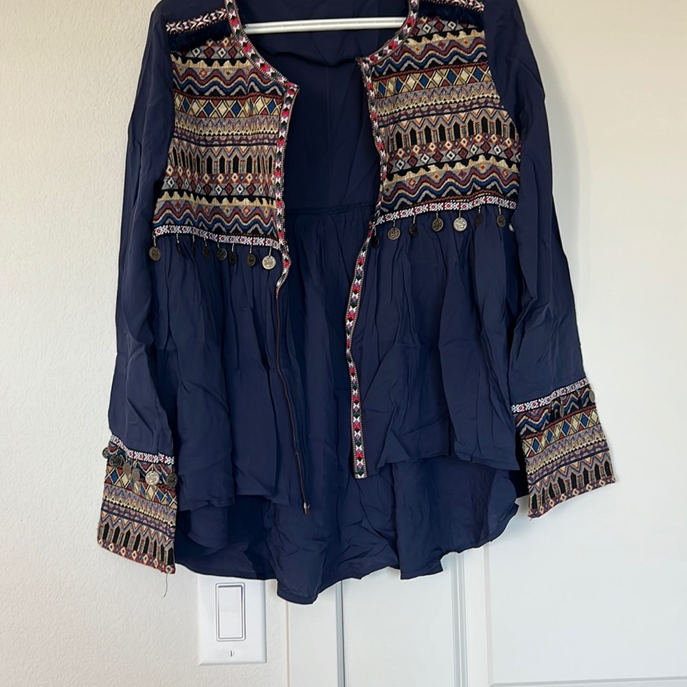 Embroidered over throw